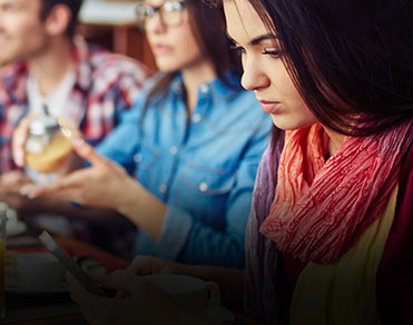 Closeup of female employee reading iPad